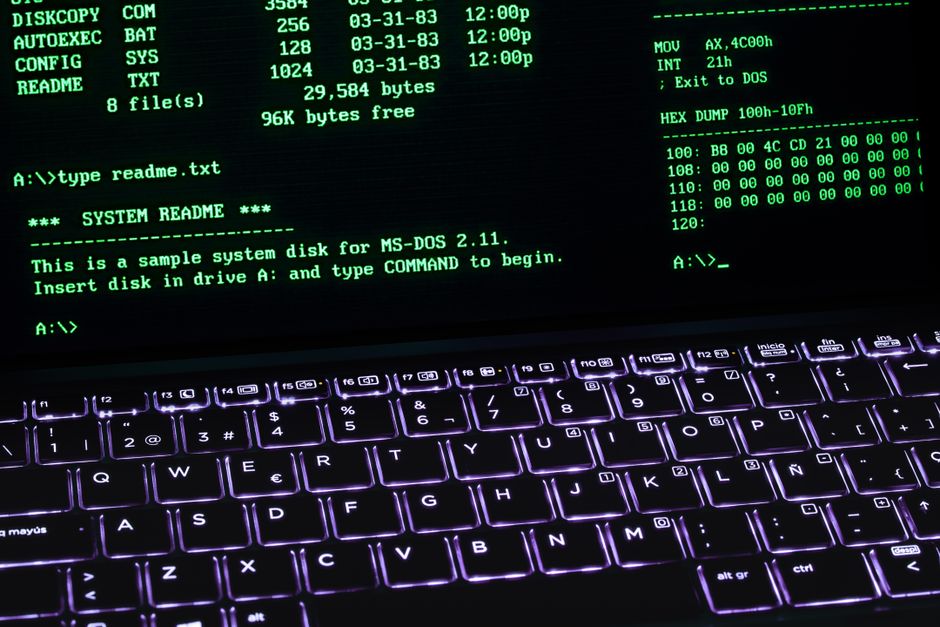 Retro terminal screen glowing on a keyboard, representing a Gemini CLI session