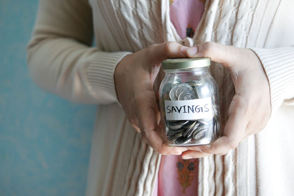 Coins in a savings jar illustrating how to stop burning tokens and money in Claude Code